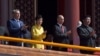 Former Kazakh President Nazarbaev (left) is seen with presidents Vladimir Putin of Russia and Xi Jinping of China (right) at a military parade. (File photo) 