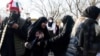 Female spectators gather outside the Mashhad stadium for a World Cup qualifying match between Iran and Lebanon on March 29.