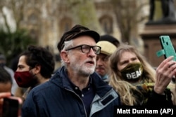 Jeremy Corbyn attends a protest rally in London in April 2021.