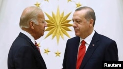 Then-U.S. Vice President Joe Biden (left) meets with Turkish President Recep Tayyip Erdogan in Ankara in 2016.