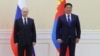 Russian President Vladimir Putin (left) with Mongolian President Ukhnaa Khurelsukh (file photo)