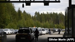 Cars coming from Russia wait in long lines at the border checkpoint between Russia and Finland near Vaalimaa on September 22, after the Kremlin announced a "partial" mobilization.