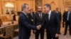 Azerbaijani Foreign Minister Ceyhun Bayramov (left) shakes hands with U.S. Secretary of State Antony Blinken (right) as Armenian Foreign Minister Ararat Mirzoyan (center) looks on in New York on September 19.