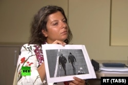 RT editor in chief Margarita Simonyan during her interview with Barishov and Petrov