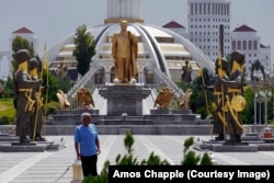 A monument to former President Niyazov in Ashgabat. Away from the gold and white marble of the capital, Turkmenistan’s rural areas could hardly be more different.