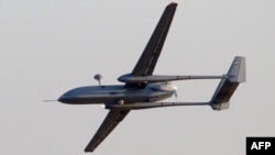 A Hermes 500 UAV flies over the Hatzerim air force base in southern Israel's Negev desert in 2011.