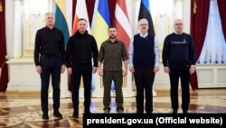 Lithuanian President Gitanas Nauseda (left), Polish President Andrzej Duda (second left), Ukrainian President Volodymyr Zelensky (center), Latvian President Egils Levits (second right), and Estonian President Alar Karis in Kyiv on April 13. 