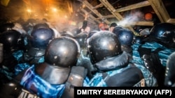 Ukrainian riot police clash with antigovernment protesters on Independence Square in Kyiv. There has been speculation in recent weeks that there is widespread discontent among Ukraine's security forces. 