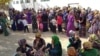 People line up outside a state grocery store to buy cooking oil in the Turkmen city of Mary in 2019.