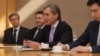 Moldova's deputy prime minister, Iurie Leanca (center), holds a hard drive containing a Holocaust-era archive of documents at the U.S. Holocaust Memorial Museum in Washington.