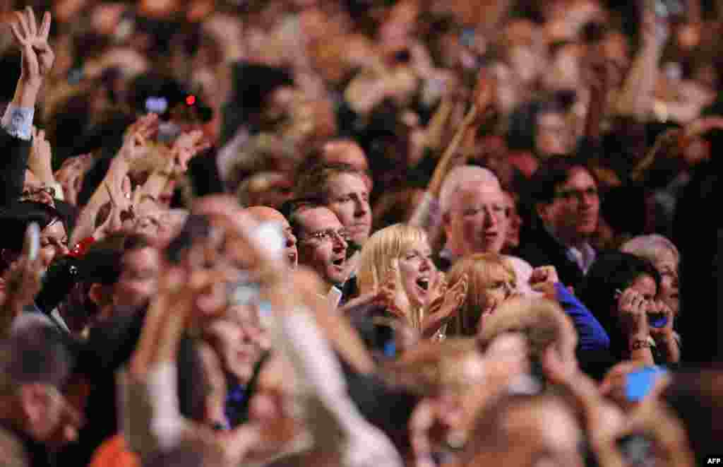 Obama supporters celebrate in his hometown of Chicago after CNN projected victory for the incumbent president.