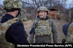 Ukrainian President Volodymyr Zelenskiy visits the front line in the Mariupol region on April 9.