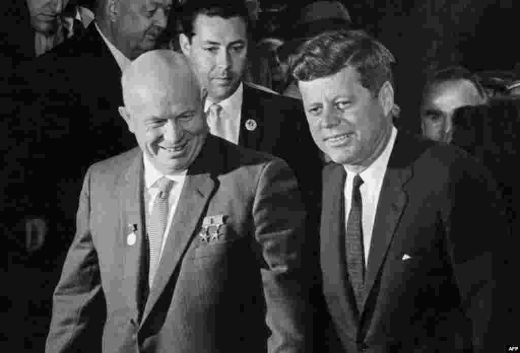 President Kennedy and Soviet leader Nikita Khrushchev head to their first meeting in June 1961 to start a round of talks in Vienna. This was a year before the beginning of the Cuban missile crisis, during which Kennedy ordered a blockade of Cuba after the Soviet Union began to transport missiles to the island. 