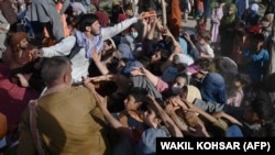 Fleeing Fighting, Afghans Flood Into Kabul And Gather At Pakistan Border