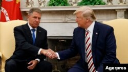 Romanin President Klaus Iohannis (left) and U.S. President Donald Trump at the White House on August 20.