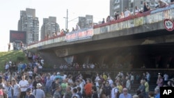 Protesters block traffic on the main highway passing through Belgrade on June 30.