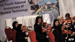 Members of the Iranian National Orchestra perform in Tehran in a 2010 ceremony marking National Nuclear Day.