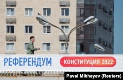 A banner on a bridge in Almaty reads, "Referendum. Constitution 2022."