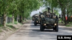 British soldiers travel in Lithuania in 2017. Prime Minister Boris Johnson said the forces in the region could be bolstered amid tensions with Russia.