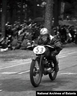 Women’s motorcycling champion Virve Gustel takes part in a race in 1953.