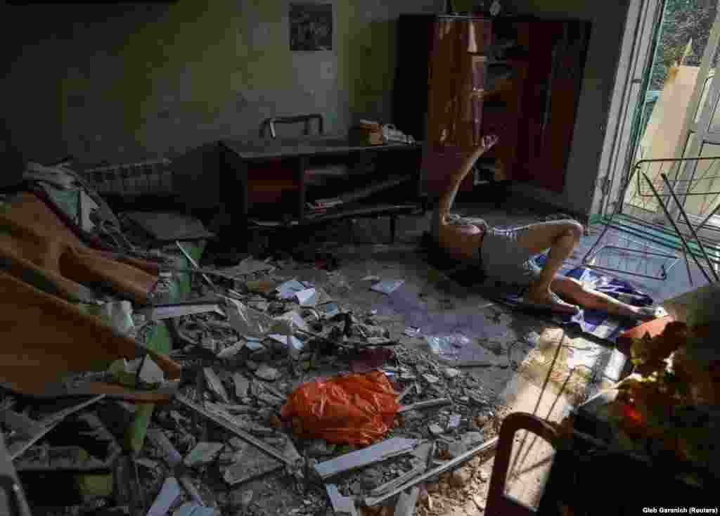 Volodymir lies injured on the floor of his home after it was struck by shelling in Kramatorsk. According to Ukraine&#39;s regional governor of Donetsk, the missile strike in a residential area of Kramatorsk killed at least one person and injured six others. &quot;This is a deliberate attack on civilians,&quot; Pavlo Kyrylenko said, adding that it would continue until the Russians were apprehended.