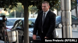 Aleksandar Sindjelic arrives at court to give testimony at the coup trial in Podgorica on October 27.