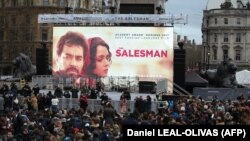 Crowds gather in Trafalgar Square, London, for a public screening of the film The Salesman on February 26.