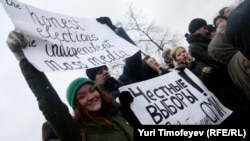 Protesters at a Moscow rally on December 10 to protest alleged violations in the parliamentary elections nearly a week earlier.