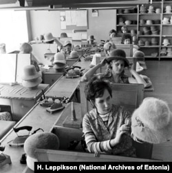 Hatmakers working on their new creations in 1972.