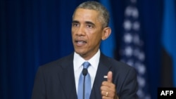 U.S. President Barack Obama speaks during a joint press conference with his Estonian counterpart, Toomas Hendrik Ilves, in Tallinn.