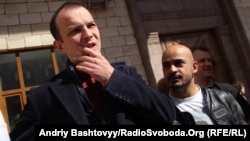 Yegor Sobolev (left) became frustrated with journalism and moved into politics.