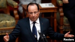 French President Francois Hollande delivers a speech at the upper house of parliament in Tokyo on June 7.