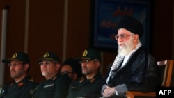 Iran's supreme leader, Ayatollah Ali Khamenei (right), during an early October visit to the Military College of Tehran