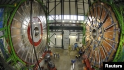 Overview of the first elements of the huge magnet of the CMS (Compact Muon Solenoid) experimental site at CERN. (file photo)