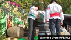 Moldovans preparing to celebrate an event called National Wine Day in October 2012.