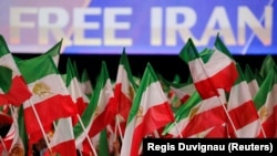 Supporters of the National Council of Resistance of Iran attend a rally in Villepinte, near Paris, on June 30.