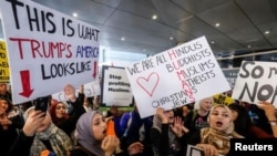 Demonstrators rally against the immigration rules implemented by U.S. President Donald Trump's administration at Los Angeles International Airport last month.