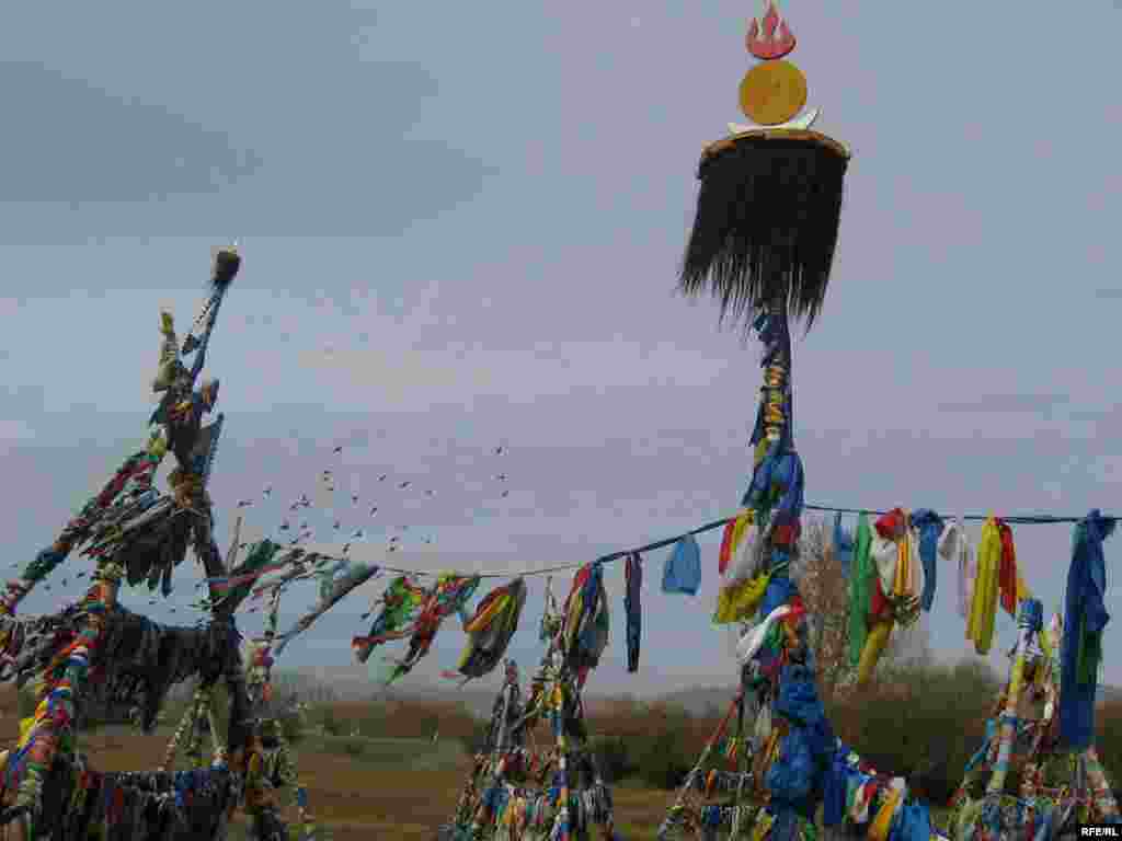 A roadside shaman shrine south of the Mongolian capital. - Even more than Buddhism, shamanism is the guiding spiritual tradition among traditional nomadic tribes in Mongolia, Central Asia, and Siberia. Mongolian drivers will typically beep their horn when passing a shrine. (Photographs by Daisy Sindelar)