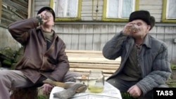 Men drinking home made alcohol in Russia's Ivanovskaya region