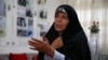 Faezeh Hashemi speaks to an interviewer in Tehran on September 6.