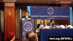 Then-Commerce Minister Anwarul Haq Ahadi, seen during a press conference in Kabul in June, is the most prominent of the 16 disqualifications.