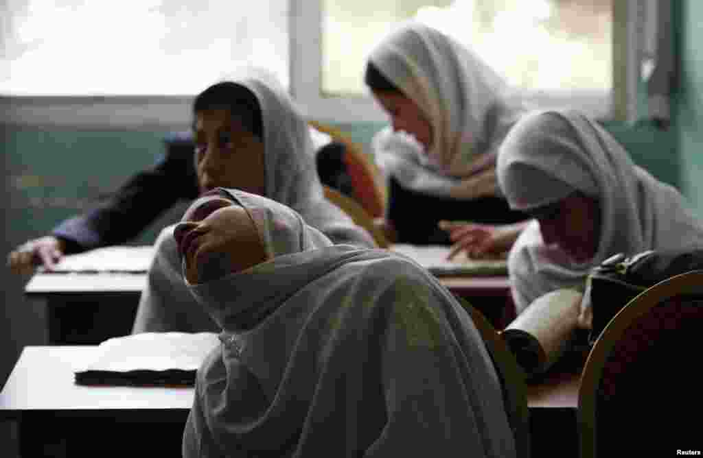 Blind students attend a lesson at the school.