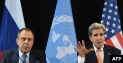 U.S. Secretary of States John Kerry (right) and Russian Foreign Minister Sergei Lavrov talk to the press after meeting in Munich.