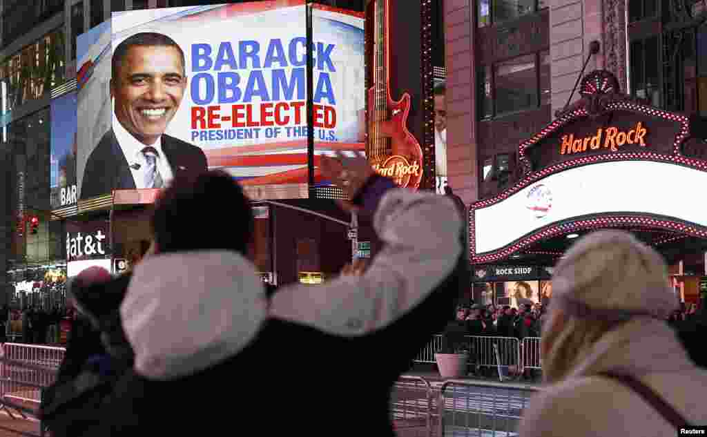 People watch results roll in at Times Square in New York City.