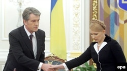 Ukraine's constitutional wrangling has turned President Viktor Yushchenko (left) and Prime Minister Yulia Tymoshenko from Orange allies into bitter rivals.