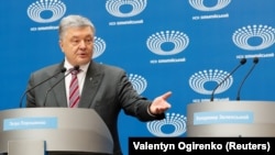 Petro Poroshenko, speaks next to an empty podium prepared for his opponent, Volodymyr Zelenskiy, at a failed attempt to hold a debate in Kyiv on April 14.