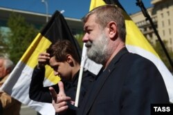 Russian opposition politician Vyacheslav Maltsev (right) at a Russian opposition rally on May 6, 2017.