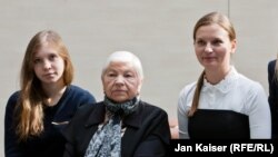 Left to right: Maria Paraskevich and Maria Grigorieva, the daughter and mother of Tatiana Paraskevich, with Lyudmyla Kozlovska, president of the Open Dialog Foundation.