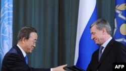 UN Secretary General Ban Ki Moon (left) exchanges signed documents with head of the Collective Security Treaty Organization Nikolai Bordyuzha at a press conference in Moscow on March 18, 2010