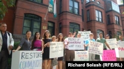 Tajik-Americans demonstrate outside Dushanbe's embassy in Washington, D.C. on July 26.